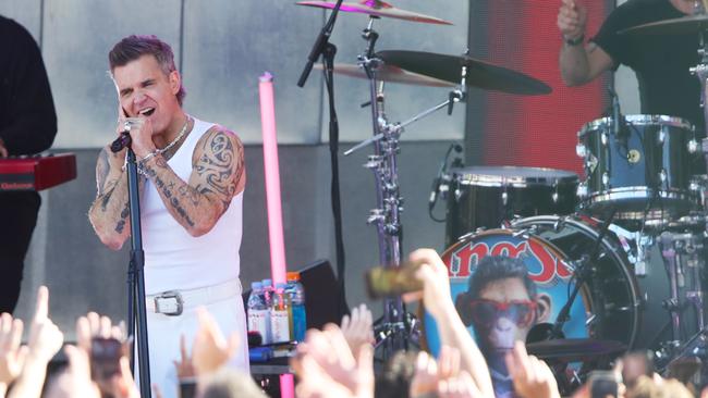 MELBOURNE, AUSTRALIA- NewsWire Photos JANUARY 2, 2025: Entertainer Robbie Williams who is holding a free mini concert at Federation Square Melbourne as part of his publicity tour for the movie Better Man. Picture:  NewsWire/ David Crosling