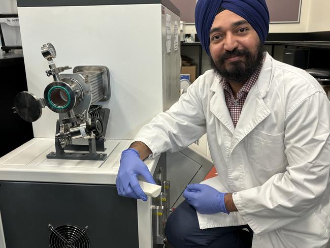 Dr Amandeep Singh Pannu, Research Fellow in the Charles Sturt University Rural Health and Research Institute in front of a tube furnace. Picture: Supplied