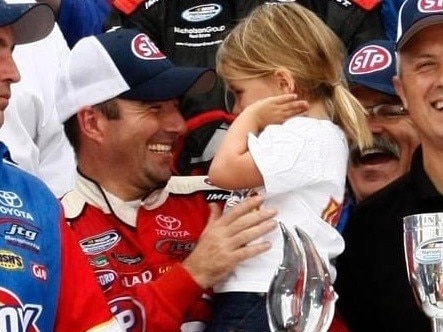 Two-time Supercars champion and former NASCAR racer Marcos Ambrose with his daughter, Tabitha, when she was young. Tabitha is now following in his footsteps in motorsport. Picture: Supplied