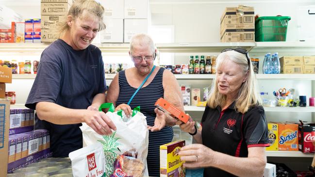 Caboolture Community Action president Sharrin Geeves with volunteers, packing hampers. Picture: Dominika Lis