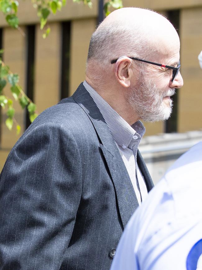 Convicted sex offender Darrel George Harington leave the supreme court in Hobart.