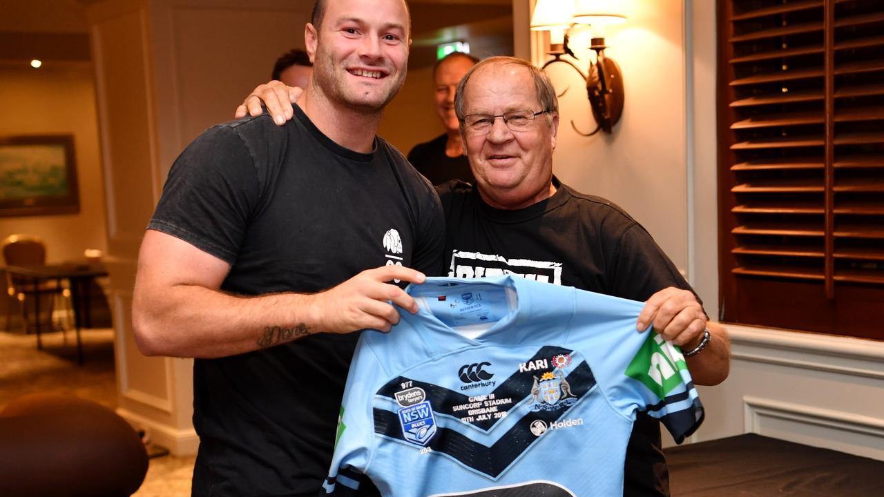 Tommy Raudonikis presents jerseys to the NSW Origin team in Brisbane in 2018.
