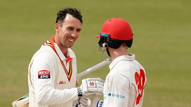 Tom Cooper of South Australia celebrates after reaching his double century. AP Image/Scott Barbour.