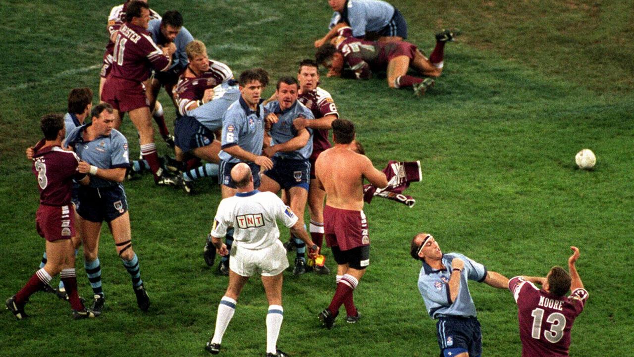 David Barnhill and Billy Moore take on each other during the infamous 1995 Origin brawl at the MCG.