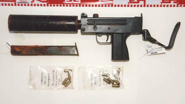 The pistol with attached silencer used in the attempted murder of Des Moran.