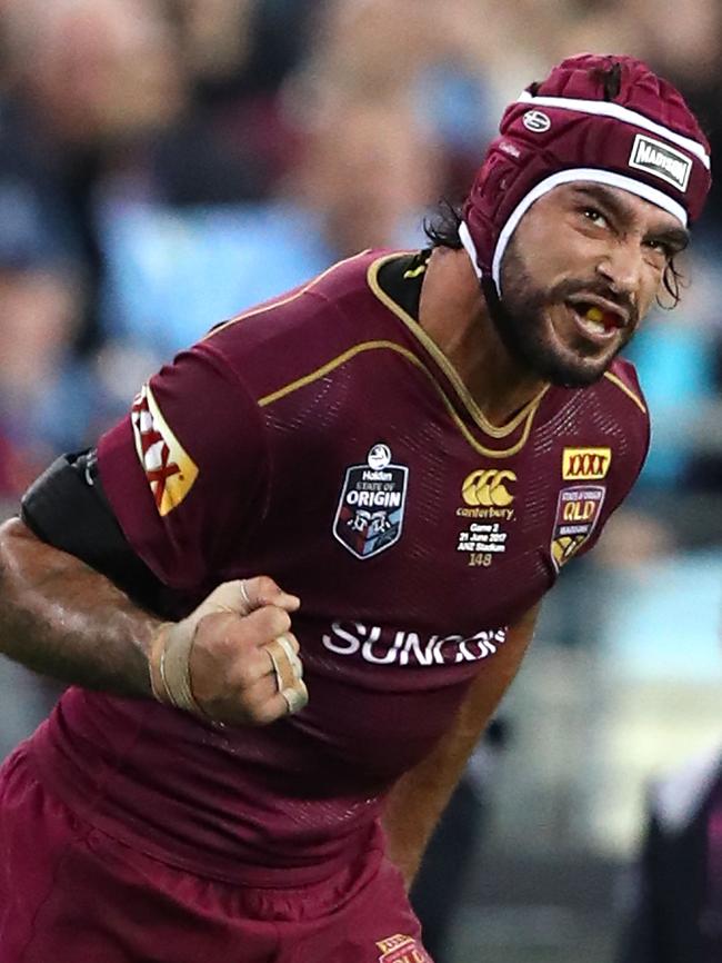 Johnathan Thurston celebrates after kicking the winning conversion in Game 2.