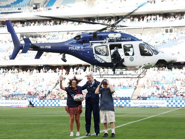 Amy Scott emerges from a Police Helicopter at Allianz Stadium. Picture: Cameron Spencer/Getty Images