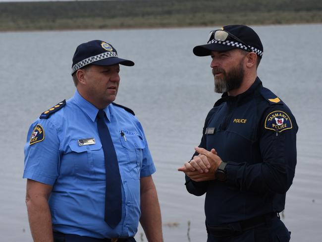 Bridgewater Division Acting Inspector Jason Klug with Sergeant Brad Conyer at Great Lake's Boundary Bay after the discovery at 11.40am Friday of the body of a missing 50-year-old fisherman. Picture: Alex Treacy