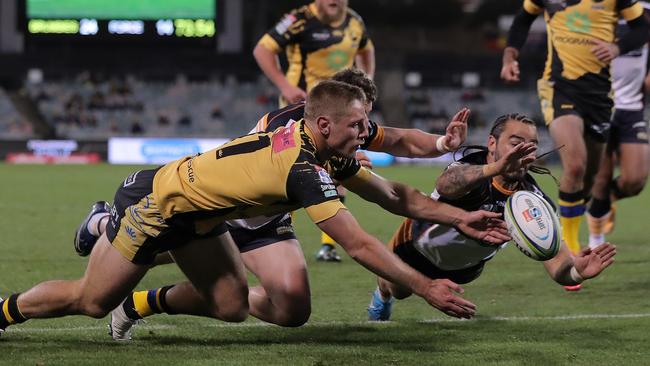 Brumbies winger Andy Muirhead scores a try against the Western Force at GIO Stadium in Canberra. Picture: Getty Images