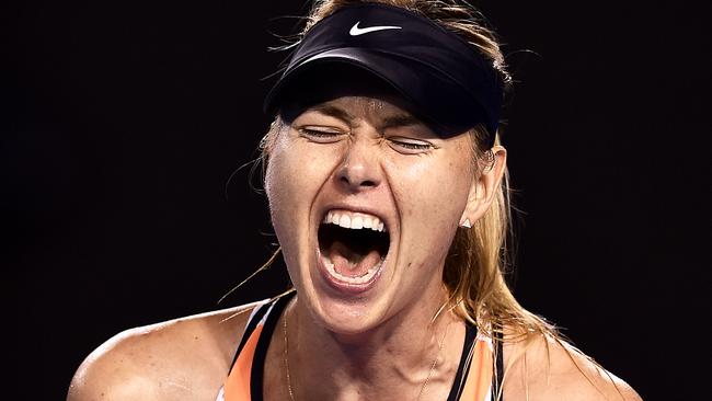 **FILE** A Sunday, Jan. 24, 2016 file photo of Maria Sharapova of Russia reacts against Belinda Bencic of Switzerland during their fourth round match on day seven of the Australian Open tennis tournament in Melbourne, Australia. Former World No.1 Maria Sharapova has announced she failed a drugs test at the Australian Open. (AAP Image/Tracey Nearmy) NO ARCHIVING, EDITORIAL USE ONLY