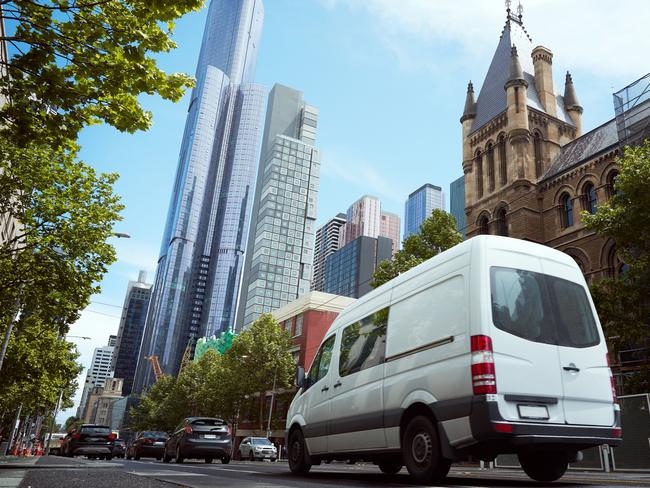 Delivery white van in the city street