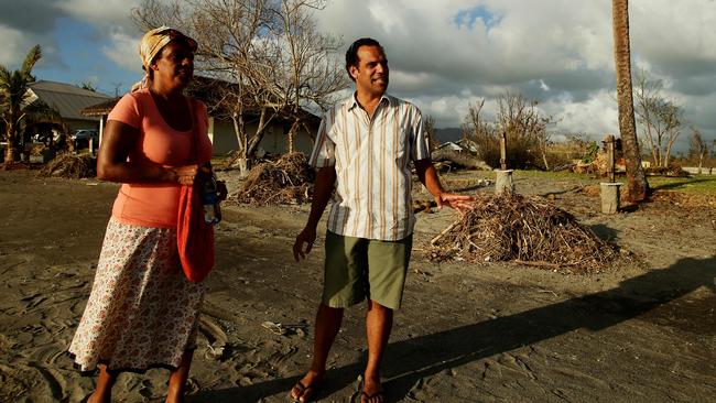 Vanuatu foreign minister Ralph Regenvanu surveys cyclone damage with his wife Jenny. Picture: Mark Calleja
