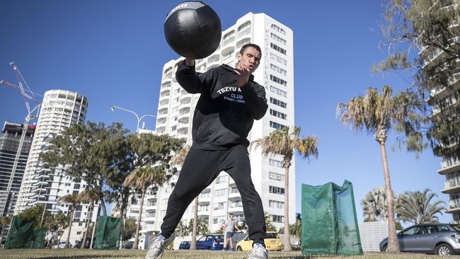 Tim Tszyu puts in some early morning training on the waterfront at Surfers Paradise. Picture: Peter Wallis