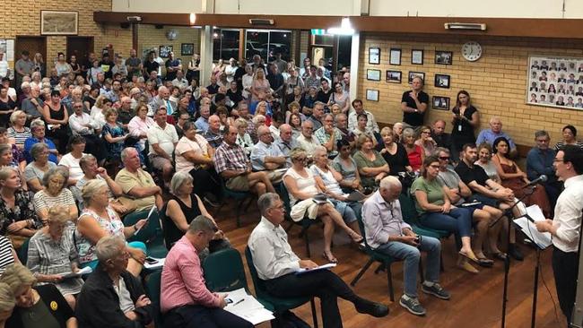 A packed meeting of residents at a forum to discuss the Gold Coast City Council's City Plan organised is addressed by Bonney MP Sam O’Connor.