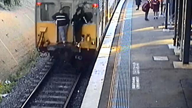 A pair were caught train surfing in Lakemba in June. Picture: Supplied