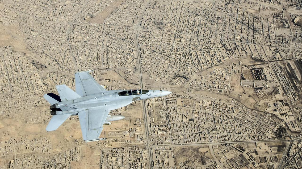 A Royal Australian Air Force F/A-18F Super Hornet flies over Mosul, Iraq. Almost 3000 air missions were conducted across 10 years of Operation Okra. Picture: FLTLT Trent.