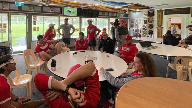 Heatherhill and Baden Powell players sit around at Bruce Park on Saturday before play was washed out. Picture: Valeriu Campan