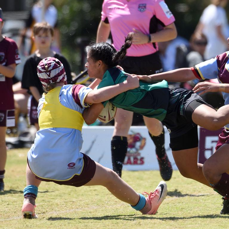 Under-12 girls' state league titles at Burleigh juniors fields Met North V South Coast. Met North's Raewyn Olomalii. (Photo/Steve Holland)