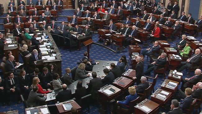 Senators vote on Donald Trump’s impeachment. Picture AFP.