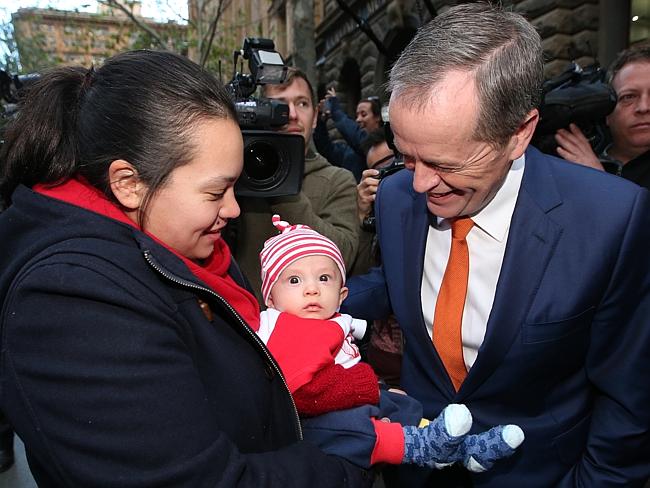 Opposition Leader Bill Shorten meeting Monika Tanaka and her 5 month old son Joseph at a Medicare rally in Martin Place Sydney. Picture Kym Smith