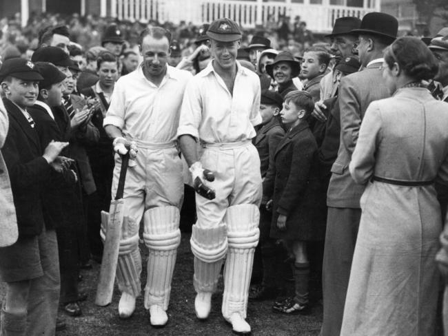 Australian cricketers Don Bradman (1908 - 2001) and Bill Brown walking out to bat for the first Test match between England and Australia at Trent Bridge, Nottingham 10 Jun 1938. Original Publication: People Disc - HW0373 (Photo by Central Press/Getty Images)