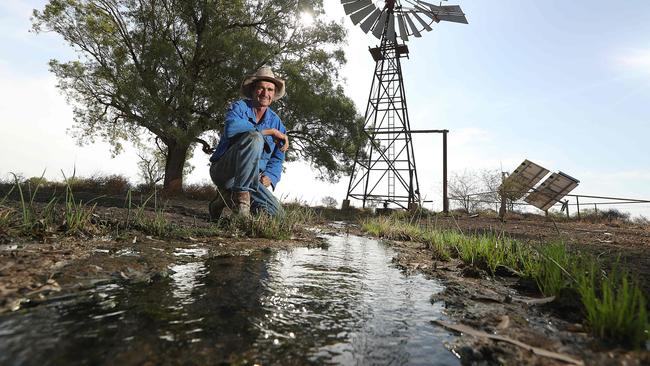 Water bore capping contractor Brett Wehl on a station west of Barcaldine, QLD that relies on ground water from the Great Artesian Basin. Picture: Lyndon Mechielsen/The Australian, 2019.