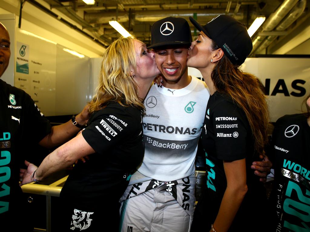 Lewis Hamilton on top of the world with second championship win | The ...