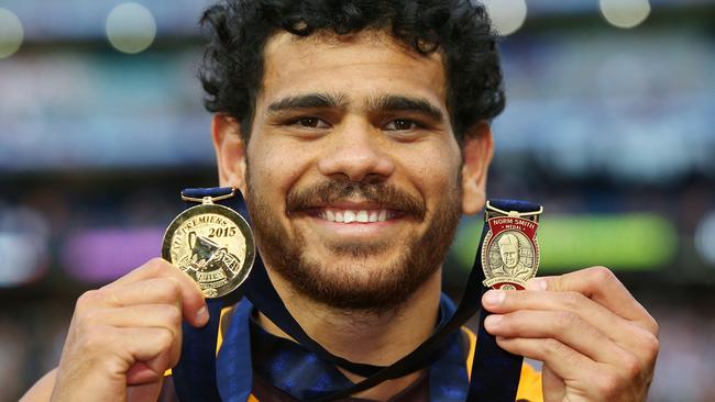 Pride ... Cyril Rioli poses with his premiership and Norm Smith Medal after Hawthorn Hawks’ 2015 AFL Grand Final win. Picture: Michael Dodge/Getty Images