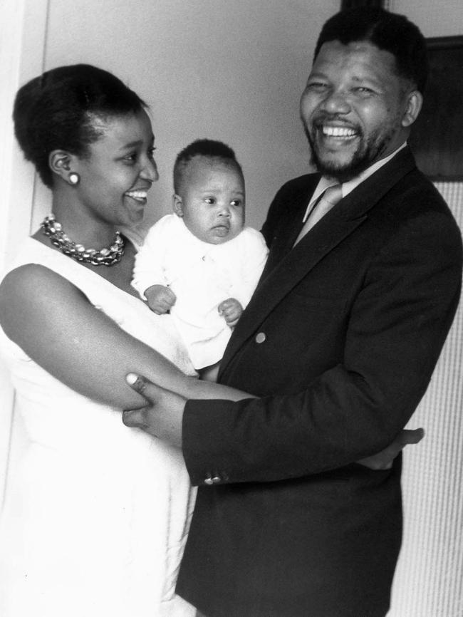 South African civil rights activist Nelson Mandela in 1961 with wife Winnie and daughter Zindzi. Picture: AP