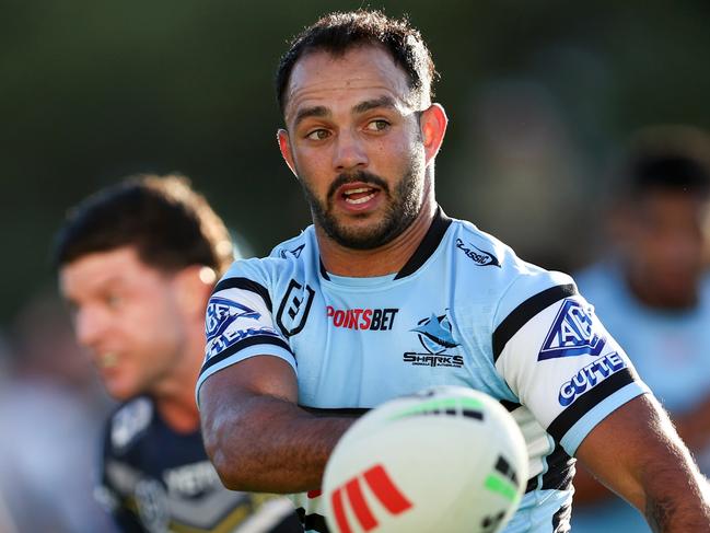 SYDNEY, AUSTRALIA - APRIL 21: Braydon Trindall of the Sharks passes the ball to a team mate during the round seven NRL match between Cronulla Sharks and North Queensland Cowboys at PointsBet Stadium, on April 21, 2024, in Sydney, Australia. (Photo by Brendon Thorne/Getty Images)