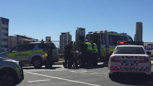 Paramedics work on a patient at the scene of the accident. Picture: Talisa Eley.