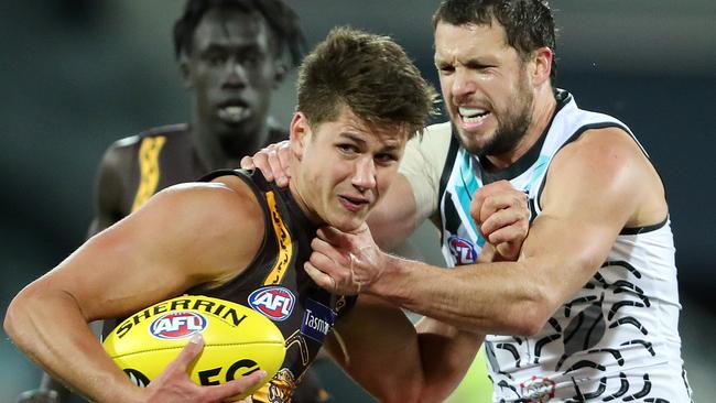 Hawthorn's Daniel Howe appears to be taken high by Port's Travis Boak. Picture: Sarah Reed