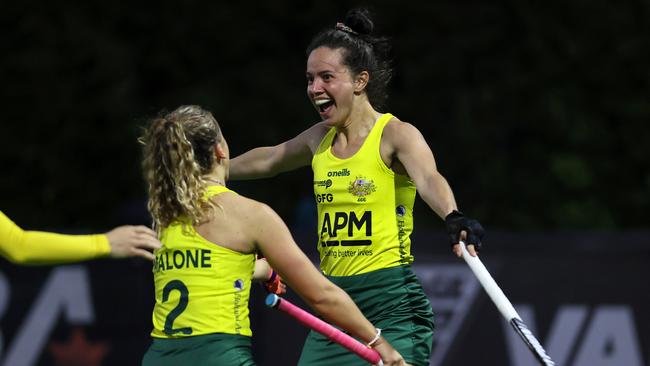 Brooke Peris celebrates her goal with teammate Rosie Malone during the 3-0 win over New Zealand.