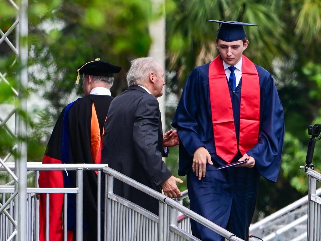 Barron Trump, son of former US President Donald Trump and former First Lady Melania Trump, takes part in his graduation at Oxbridge Academy. Picture: Giorgio VIERA / AFP