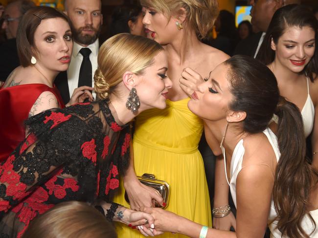 Smooching up ... Jaime King greets Selena Gomez while creating a Taylor sandwich flanked by Lorde and Lena Dunham.