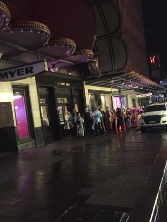 Police and medical personal escorted the passengers into the hotel early on Thursday. Picture: Twitter/@BigAlsDiners