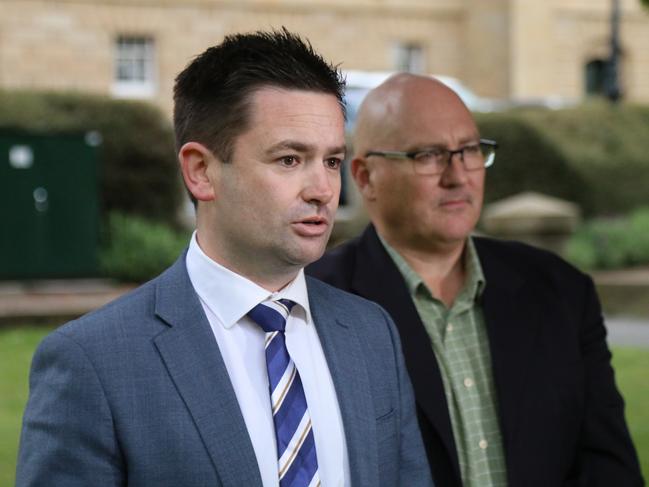 Labor's energy spokesman Dean Winter and TCCI CEO Michael Bailey speak to the media on Parliament Lawns in Hobart on Tuesday, November 7, 2023.