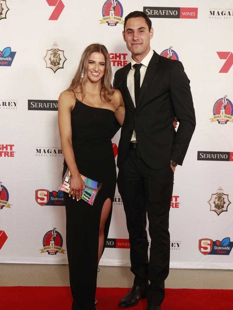 Beth Allen wearing ONS Boutique, and Troy Menzel pose for a picture on the red carpet at Adelaide Oval in North Adelaide, for the Magarey Medal, Monday, September 9, 2019. Picture: Matt Loxton