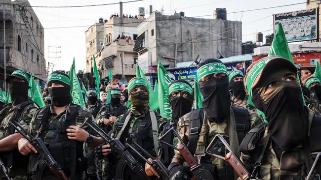 Palestinian Hamas militants attend a military show in the Bani Suheila district in Gaza City, Gaza, on July 20, 2017.Chris McGrath / Getty Images file