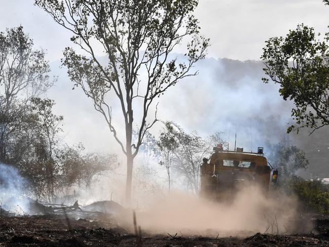 Scrub fire at Julago, just south of Townsville, causes delays to traffic on Bruce Highway. Rural Fire fighters from Nome. Picture: Evan Morgan