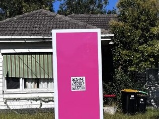 House listing with QR code sign. Picture: Reddit/CaseyRealEstate