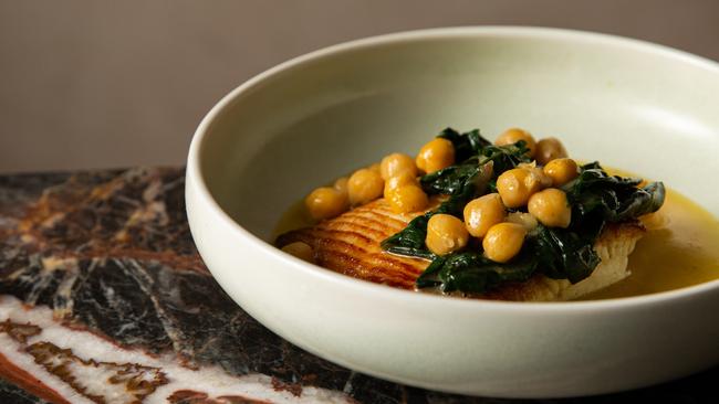 Roasted skate with silverbeet and chickpeas. Picture: Annika Kafcaloudis