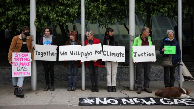 Protesters gather at the front of the Federal Court in November 2022 for the appeal by Santos to restart drilling on its Barossa gas project. Picture: Getty Images