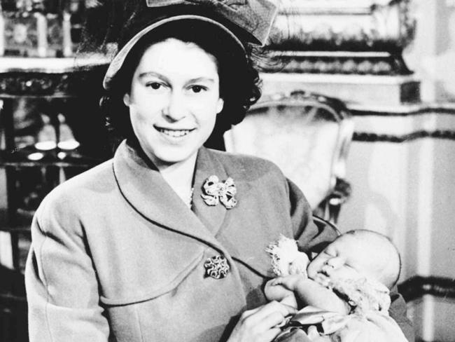 Princess Elizabeth (later Queen Elizabeth II) with baby son Prince Charles at his Christening on 15 December, 1948. Picture: News Corp