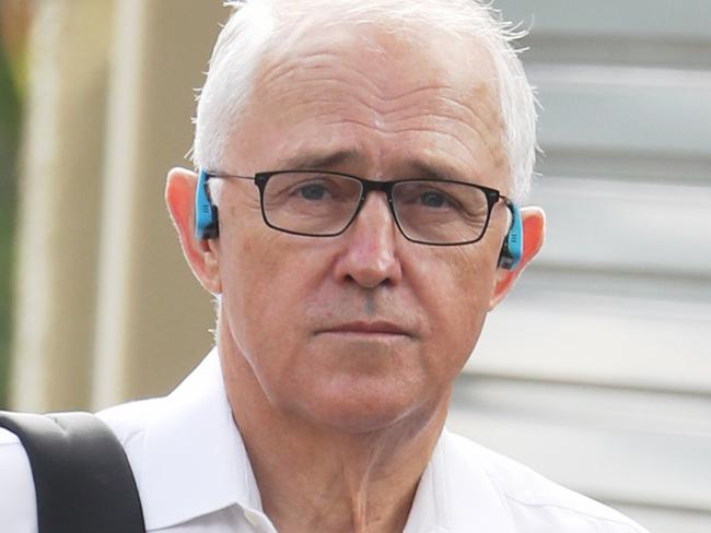 Ex PM Malcolm Turnbull leaves home on foot to catch the Victor Chang ferry from Rose Bay .picture John Grainger