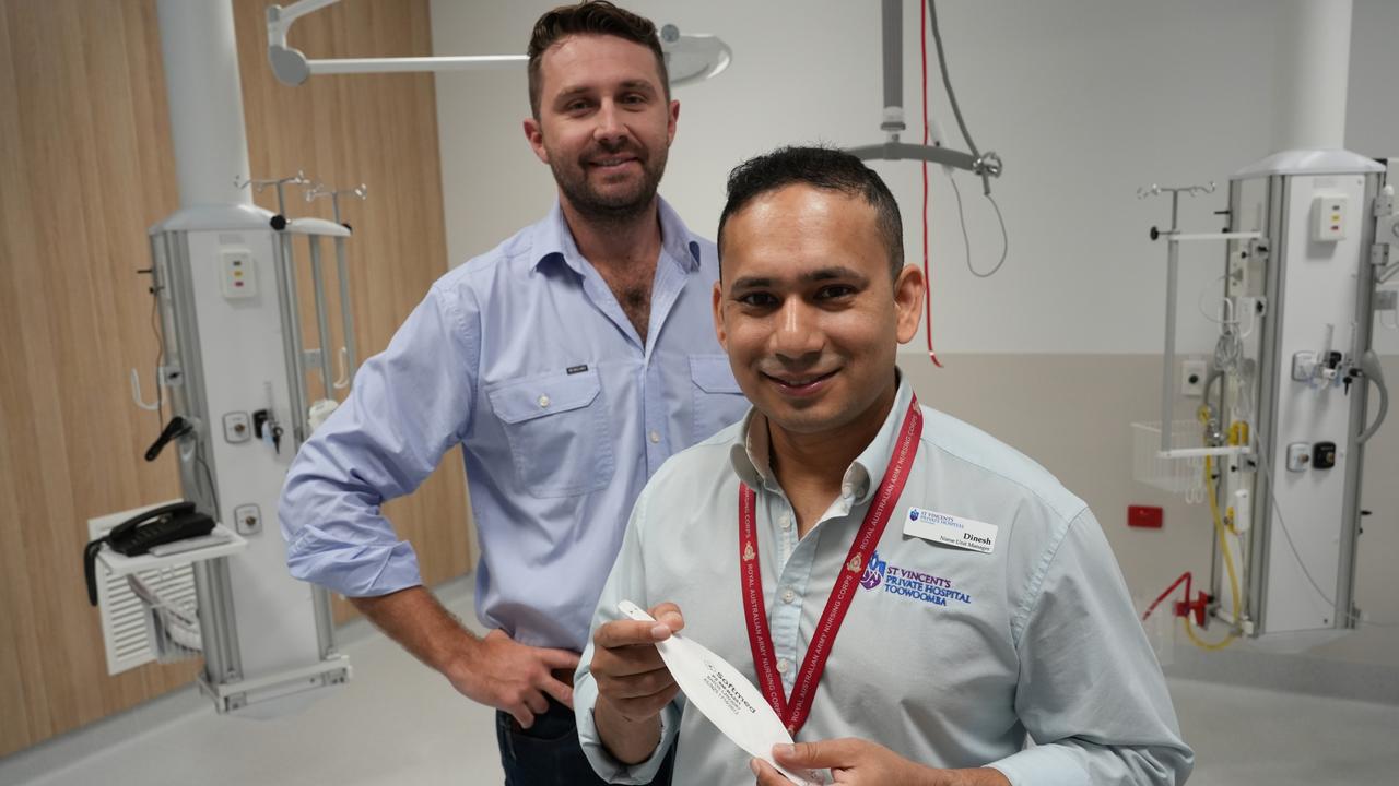 Checking out the new intensive care unit at St Vincent's Hospital Toowoomba are nurse unit manager Dinesh Kathayat and Hutchinson Builders project manager Tim Thompson. The ICU includes two negative-pressure rooms.