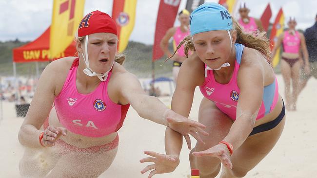 L to R: Elle Rose Shearer from SA and Kaitlyn Williams NSW in the pathway beach flags.