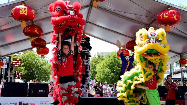 Members of the Trinity College lion dancers perform at the Adelaide Lunar New Year Street Party on Gouger St on Friday night. Picture: Bianca De Marchi