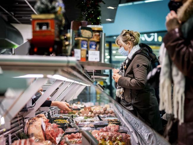 A butcher’s counter as a customer shops for Christmas in Beverwijk, Netherlands. Picture: Remko de Waal / ANP / AFP / Netherlands OUT