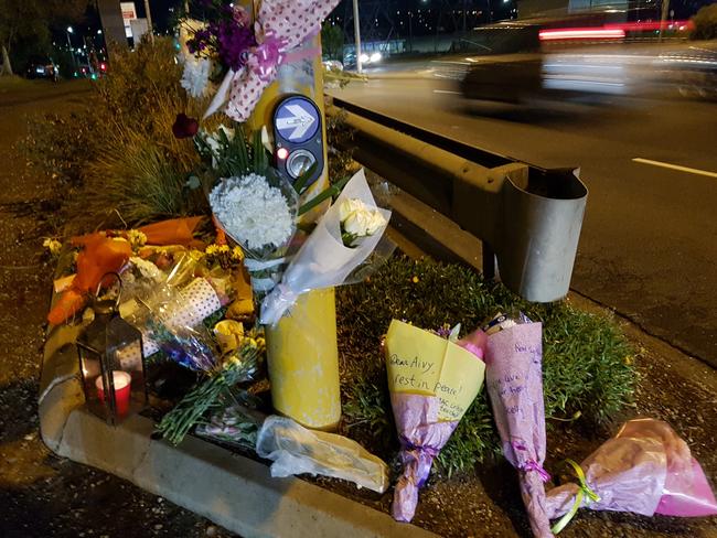 Flowers and a candle at the scene of the Ringwood crash which claimed the life of Aivy Nguyen on May 16.